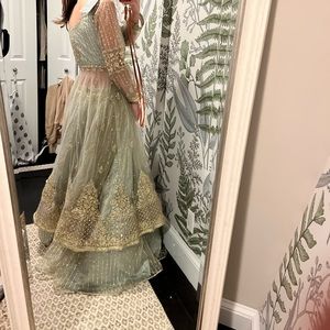 Lehenga. Brand new, didn’t have time to get fitted. Small.